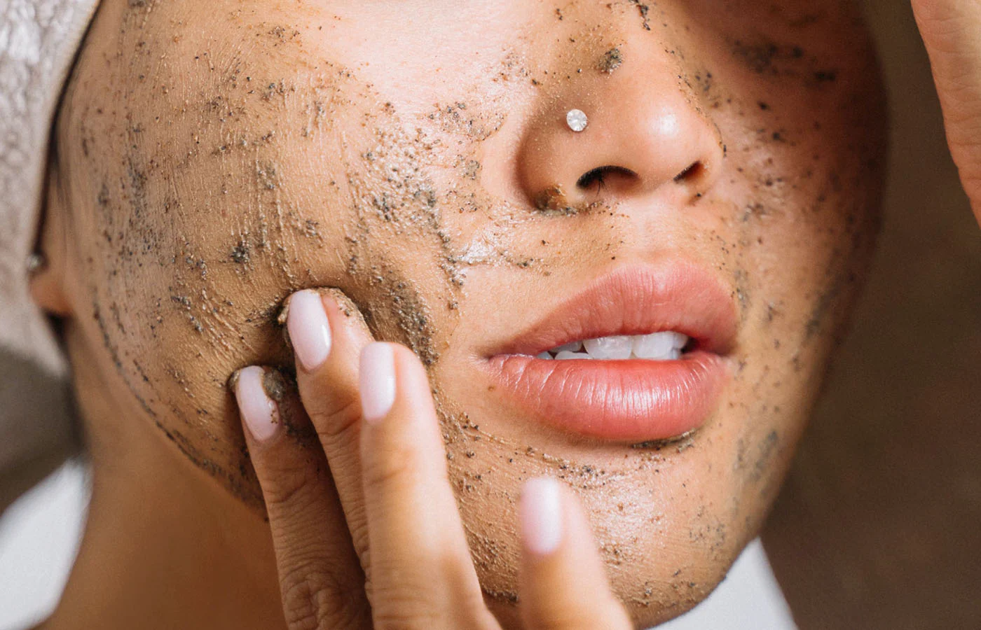 Gentle face scrub treatment at Styles 'N' Smiles Unisex Salon in Singapore.