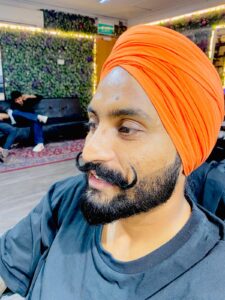 Davendar Sain, mustache specialist at Styles and Smiles Unisex Salon